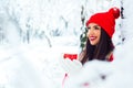 Girl drinking hot tea in the winter forest - Image Royalty Free Stock Photo