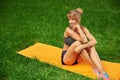 Girl engaged in fitness and gymnastics in the park Royalty Free Stock Photo