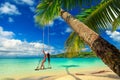 Young beautiful girl enjoy vacation on tropical paradise beach.