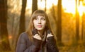 Young beautiful girl in evening autumn forest Royalty Free Stock Photo