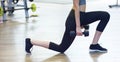 Young beautiful girl in the gym doing exercises on the squat with a barbell, improving the muscles of the buttocks and legs Concep Royalty Free Stock Photo