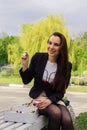 Young beautiful girl having lunch in the park Royalty Free Stock Photo