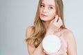 girl holding a jar of useful bamboo cotton buds