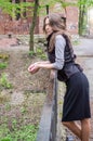 A young beautiful girl with long hair walks through the spring Stryjsky park in Lviv Royalty Free Stock Photo