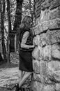 A young beautiful girl with long hair walks through the spring Stryjsky park in Lviv Royalty Free Stock Photo