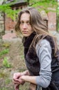 A young beautiful girl with long hair walks through the spring Stryjsky park in Lviv Royalty Free Stock Photo