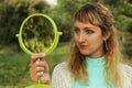 Young beautiful girl look into mirror in the park.Soft and blur conception Royalty Free Stock Photo