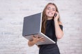 Female long-haired office manager or administrator with notebook Royalty Free Stock Photo