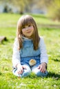 Young beautiful girl, playing with little newborn chick in the p Royalty Free Stock Photo