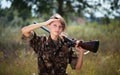 Young beautiful girl with a shotgun outdoor Royalty Free Stock Photo