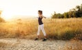 Young beautiful girl sports in the autumn forest at sunset Royalty Free Stock Photo