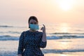 Young beautiful girl stands near the sea Royalty Free Stock Photo