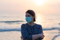 Young beautiful girl stands near the sea Royalty Free Stock Photo