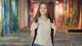 Young beautiful girl student smiling confident wearing backpack at art gallery Royalty Free Stock Photo