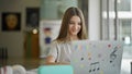 Young beautiful girl student using laptop studying at library Royalty Free Stock Photo