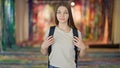 Young beautiful girl student wearing backpack with relaxed expression at art gallery Royalty Free Stock Photo