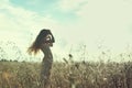 Young beautiful girl on a summer field Royalty Free Stock Photo