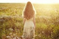 Young beautiful girl on a summer field. Beauty summertime Royalty Free Stock Photo