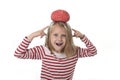 Young beautiful girl 6 to 8 years old playing with rubber brain having fun learning science concept Royalty Free Stock Photo