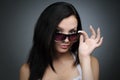 Young beautiful girl in wayfarer style glasses Royalty Free Stock Photo