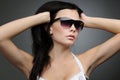 Young beautiful girl in wayfarer style glasses Royalty Free Stock Photo
