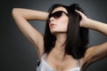 Young beautiful girl in wayfarer style glasses Royalty Free Stock Photo