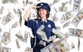 Young beautiful girl wearing police uniform very happy and smiling looking far away with hand over head Royalty Free Stock Photo