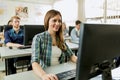 Young beautiful girl working on a computer Royalty Free Stock Photo