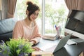 Young beautiful girl working at home, young entrepreneur concept Royalty Free Stock Photo