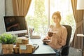 Young beautiful girl working at home, young entrepreneur concept Royalty Free Stock Photo
