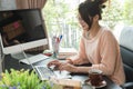 Young beautiful girl working at home, young entrepreneur concept Royalty Free Stock Photo