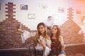 Young beautiful girls take a selfie in the hookah Royalty Free Stock Photo