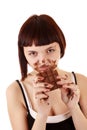 Young beautiful glutton eat chocolate isolated