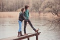 Young beautiful happy loving couple on the walk in early spring Royalty Free Stock Photo