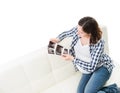 Young beautiful happy pregnant woman watching ultrasound scans