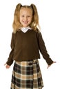 Young beautiful happy schoolgirl in pigtails and uniform smiling happy and excited having fun