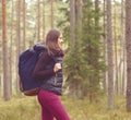 Young, beautiful and happy woman walking in forest. Camp, advent Royalty Free Stock Photo