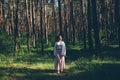 Young hippie woman walks in the summer forest laughs dances and enjoys life and nature Royalty Free Stock Photo