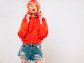 Portrait of young hipster girl posing in studio Royalty Free Stock Photo