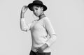 Young beautiful hipster black girl in white sweater and hat Royalty Free Stock Photo