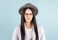 Young beautiful hispanic sad woman serious and concerned looking worried and thoughtful facial expression feeling depressed Royalty Free Stock Photo