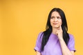 Young beautiful hispanic sad woman serious and concerned looking worried and thoughtful facial expression feeling depressed Royalty Free Stock Photo