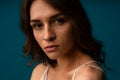 Young beautiful hispanic sad woman serious and concerned looking worried and thoughtful facial expression feeling depressed Royalty Free Stock Photo