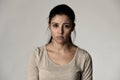 Young beautiful hispanic sad woman serious and concerned in worried depressed facial expression Royalty Free Stock Photo