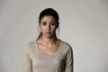 Young beautiful hispanic sad woman serious and concerned in worried depressed facial expression Royalty Free Stock Photo