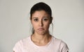 Young beautiful hispanic sad woman serious and concerned in worried depressed facial expression Royalty Free Stock Photo