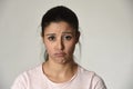 Young beautiful hispanic sad woman serious and concerned in worried depressed facial expression Royalty Free Stock Photo