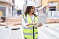 Young beautiful hispanic woman architect using laptop at street Royalty Free Stock Photo