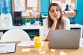 Young beautiful hispanic woman business worker boring working at office Royalty Free Stock Photo