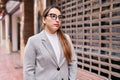 Young beautiful hispanic woman business worker standing with serious expression at street Royalty Free Stock Photo